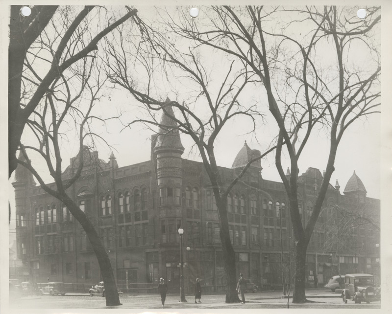 Photograph of a building to be razed at the city hall building site in Council Bluffs
