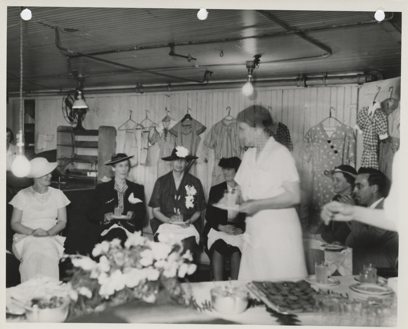 Photograph of Eleanor Roosevelt having lunch at the Sheuerman Brothers Mill in Des Moines