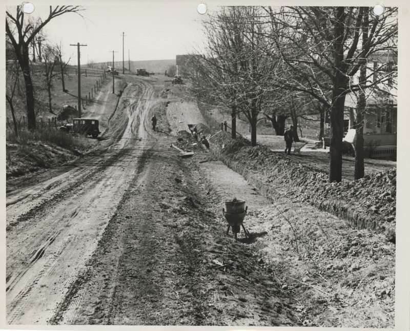 Photograph of people laying water mains in Red Oak