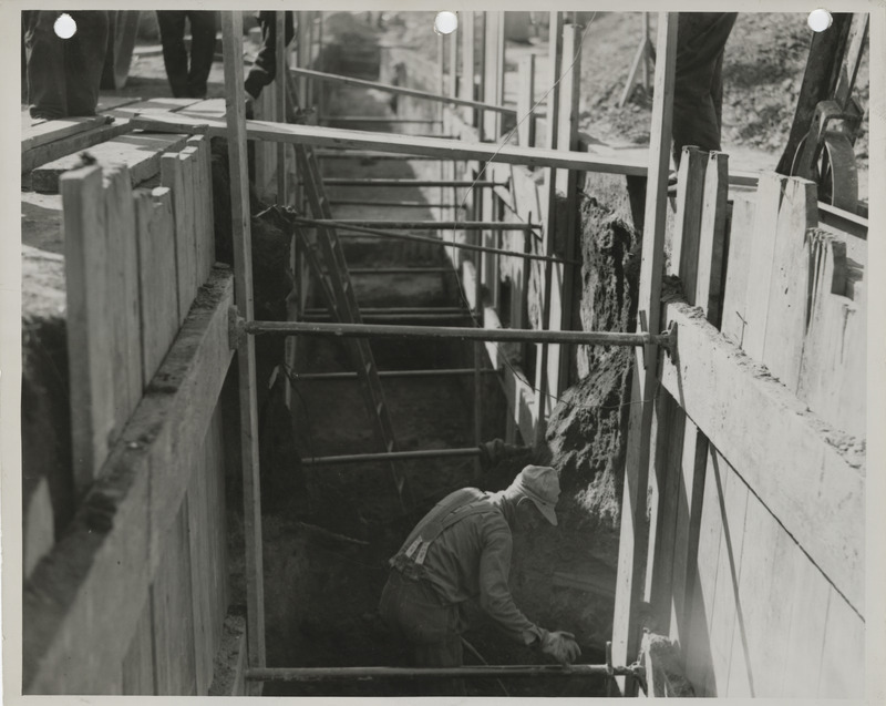 Photograph of people constructing sanitary and storm sewers in Ames