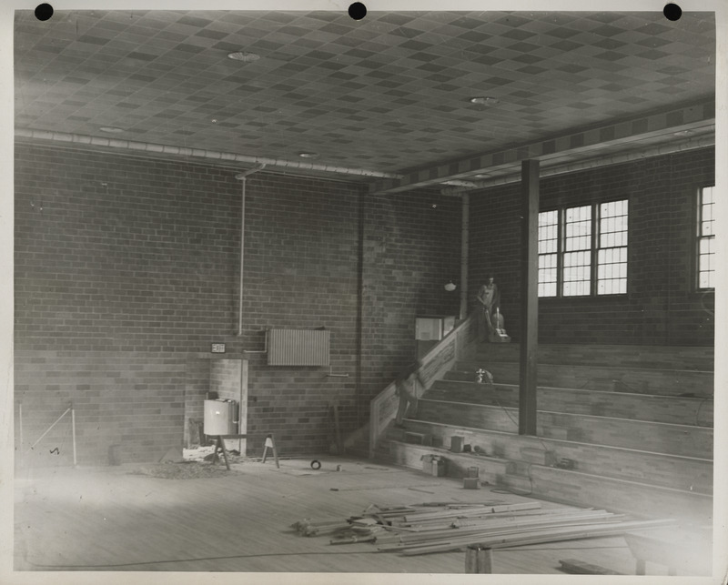 Photograph of bleacher construction at a school gymnasium in Durant