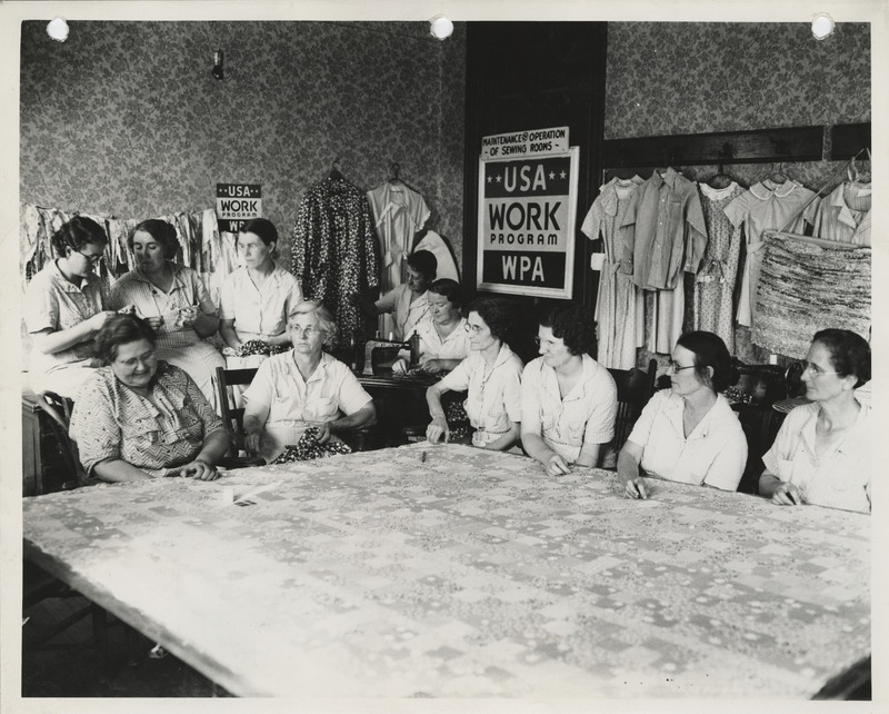 Photograph of people in a county sewing room in Corning