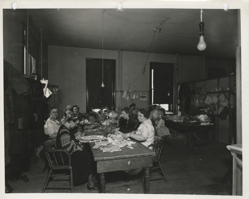 Photograph of people in a sewing room in Independence
