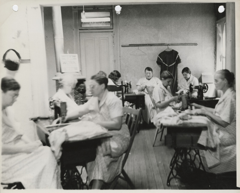 Photograph of people in a sewing room in Knoxville