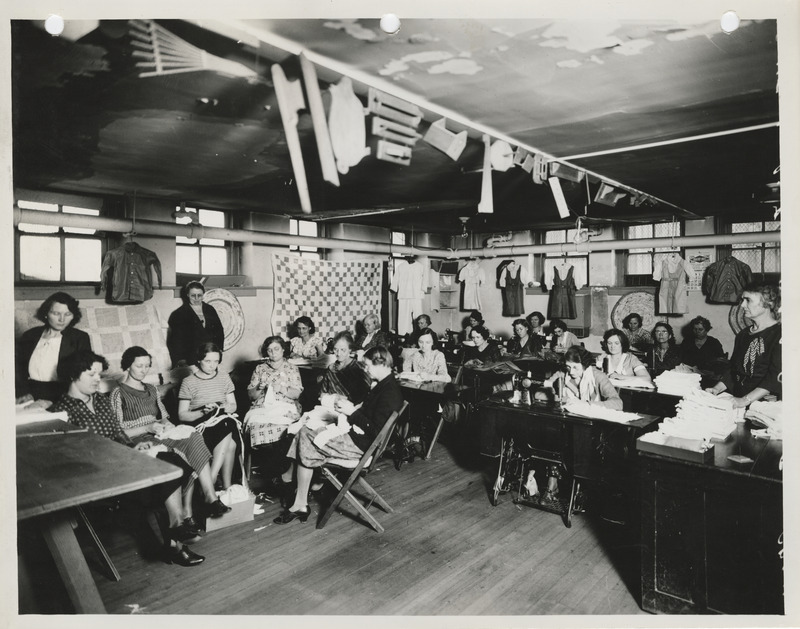 Photograph of women sewing in the sewing room of the Washington School in Council Bluffs