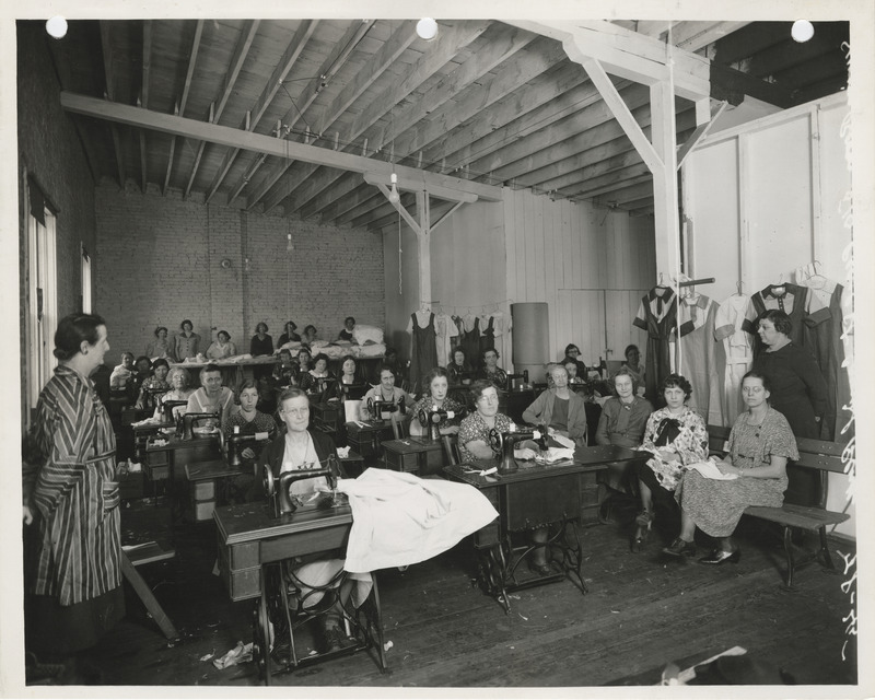 Photograph of women sewing in the sewing room at 510 Pearl Street in Council Bluffs