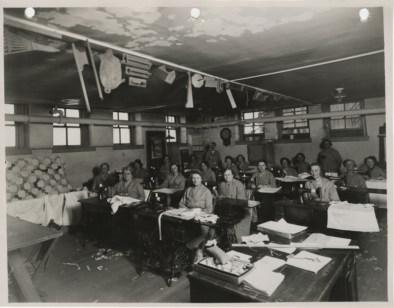 Photograph of women sewing in the sewing room of the Washington School in Council Bluffs