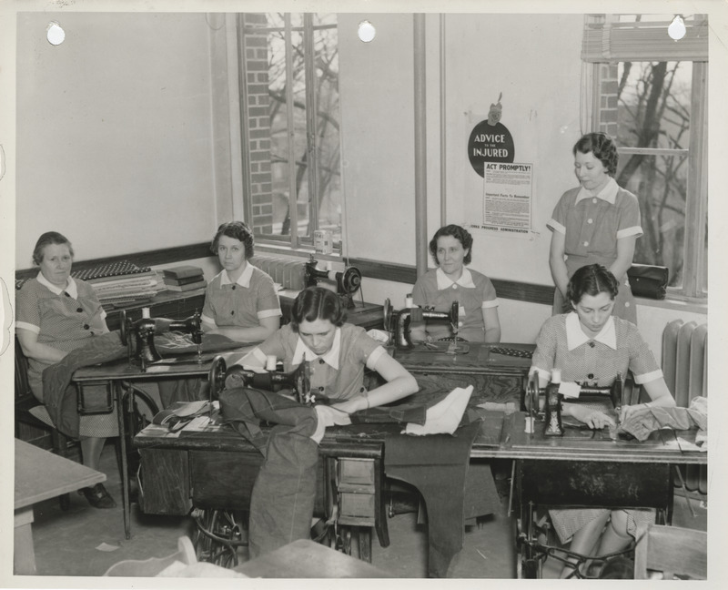 Photograph of women sewing in the sewing room of the Ringgold County Courthouse in Mount Ayr