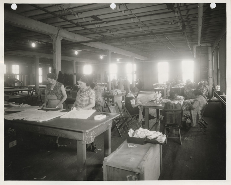 Photograph of women sewing in the Scott County sewing room in Davenport