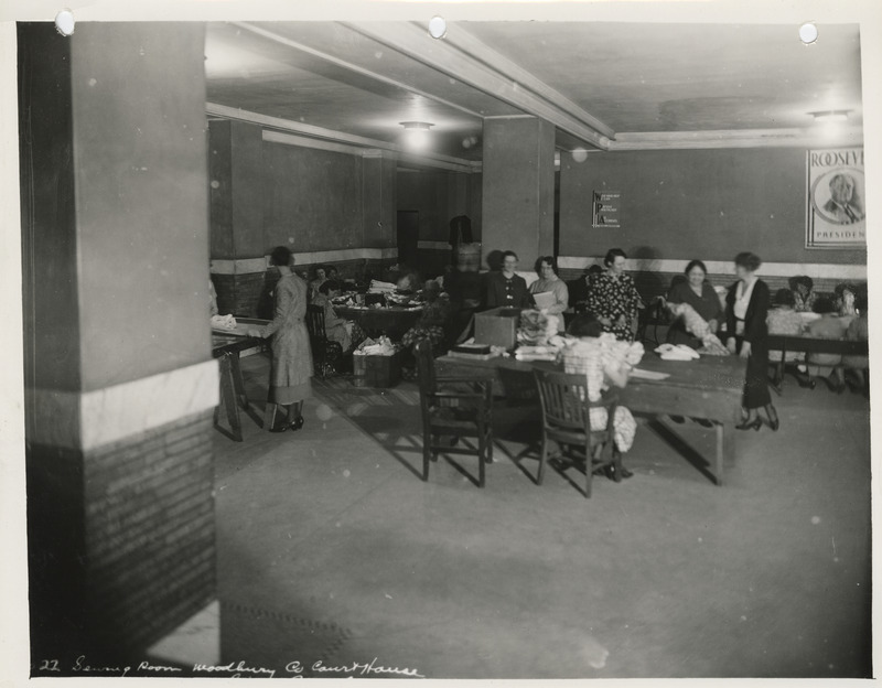 Photograph of women sewing in the sewing room of the Woodbury County Courthouse in Sioux City
