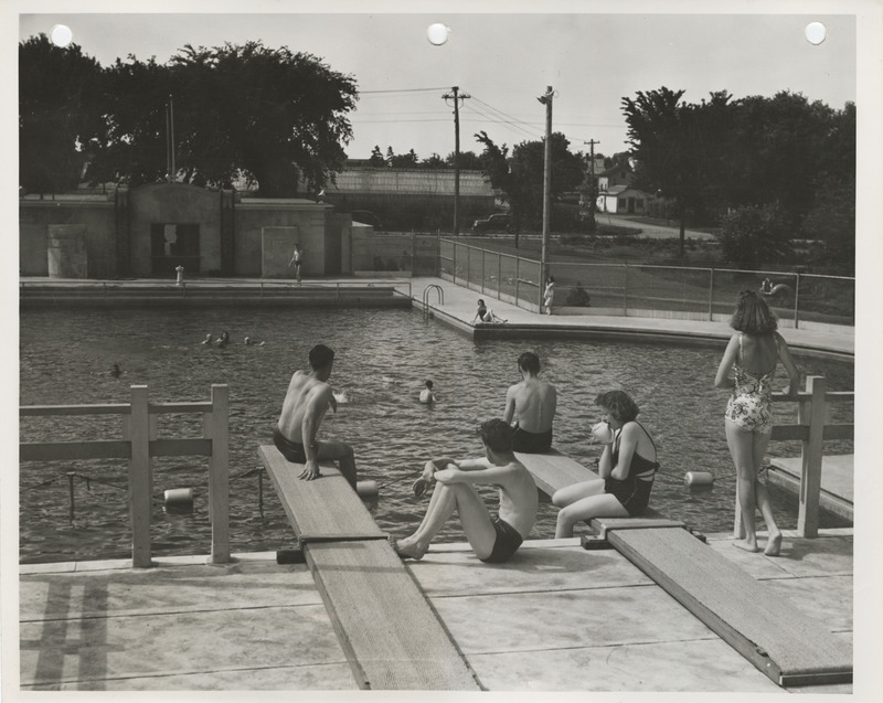 Photograph of people using the municipal swimming pool in Spencer