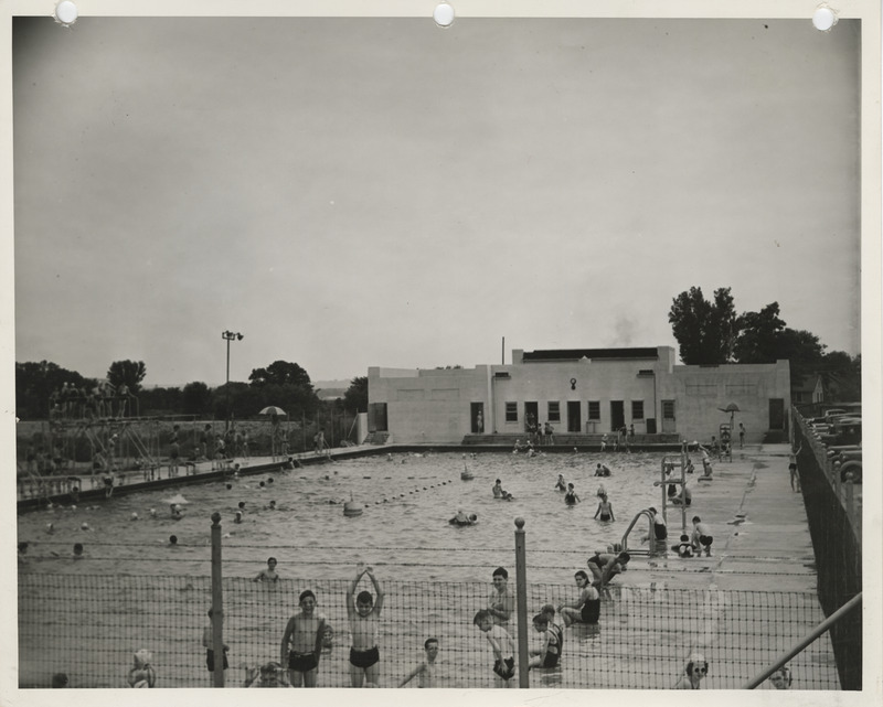 Photograph of people using the municipal swimming pool in Dubuque