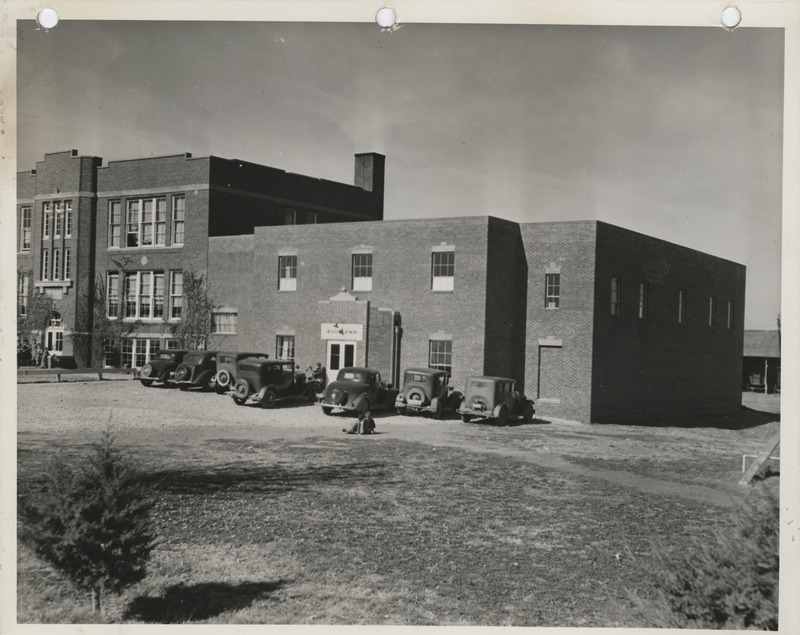 Photograph of the high school gymnasium and auditorium in Cedar