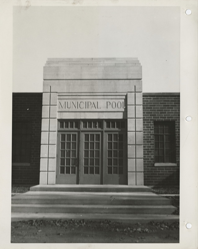 Photograph of the main entrance to the bath and shelter house at the city park in Marshalltown