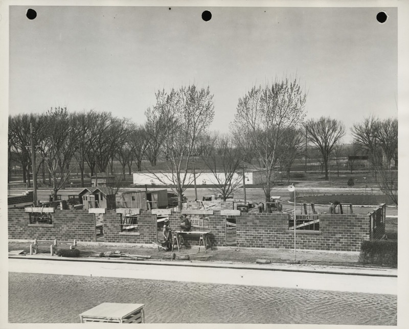 Photograph of the municipal bathhouse under construction at the city park in Red Oak