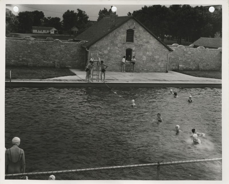 Photograph of people using the municipal swimming pool in Pocahontas