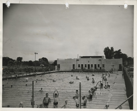 Photograph of people using the Dubuque municipal swimming pool