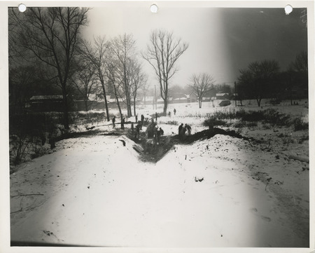 Photograph of workers deepening and widening Battle Creek in Clinton