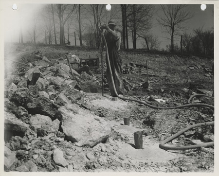 Photograph of a person working at a quarry near Columbus Junction