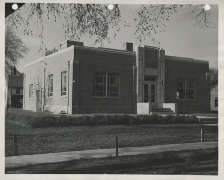 Photograph of three-quarter view of the town hall in West Liberty