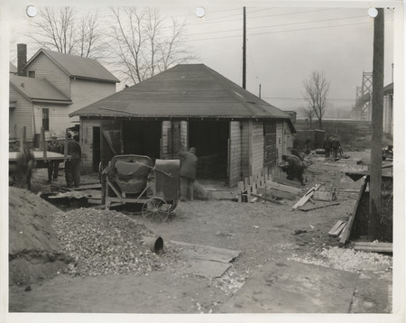 Photograph of the construction of a toolhouse and garage in Bettendorf