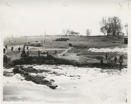 Photograph of people grading and widening Duck Creek in Davenport