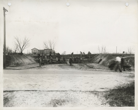 Photograph of people grading and draining Lillie Avenue and Lombard Street in Davenport