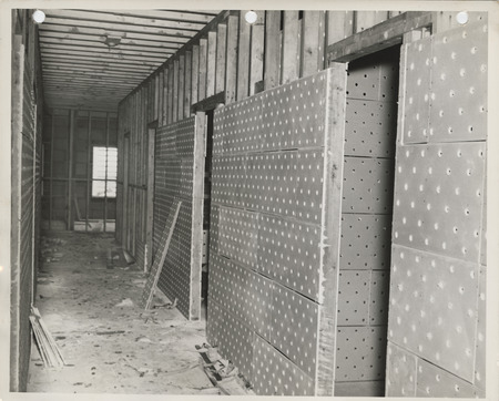 Photograph of the interior of a building at a county farm in Appanoose County