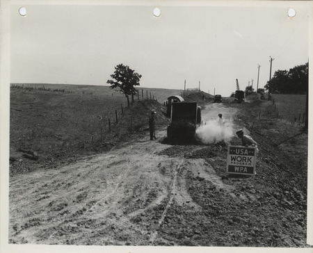Photograph of people working on a farm to market road in Appanoose County