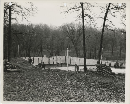 Photograph of the demolition of an old swimming pool in Centerville