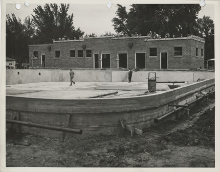 Photograph of people working on a swimming pool in Jefferson