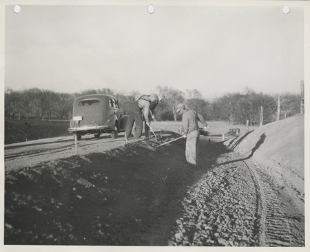 Photograph of people working on a ditch in Guthrie County