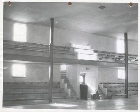 Photograph of the bleachers surrounding the entrance to the high school gym in Panora