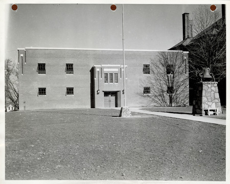 Photograph of the front view of the high school gym in Panora