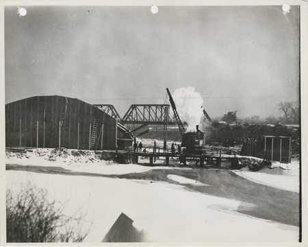 Photograph of the construction of a river bridge in Des Moines