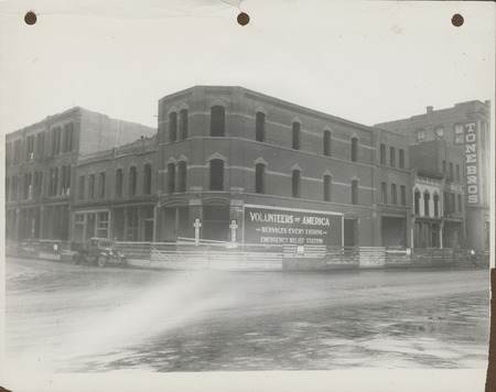 Photograph of a building being razed on 2nd and Court Ave. in Des Moines