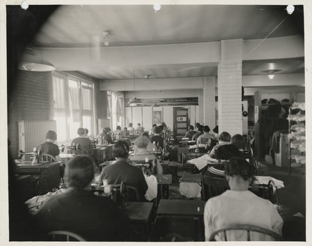 Photograph of a sewing room at city market in Des Moines