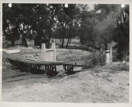 Photograph of a concrete bridge on the college golf course in Ames