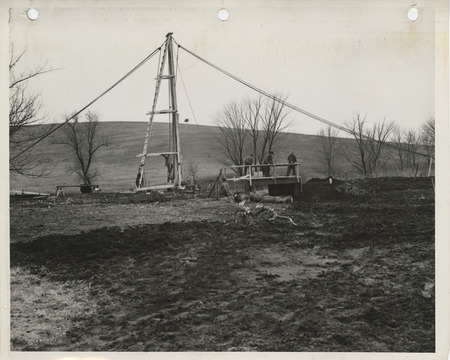 Photograph of the construction of a wood bridge on a farm to market road in Union County
