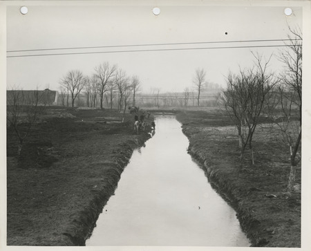 Photograph of people landscaping Water Works Park in Creston