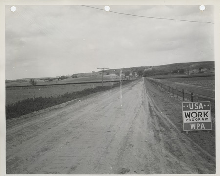 Photograph of farm-to-market road and bridge under construction in Missouri Valley