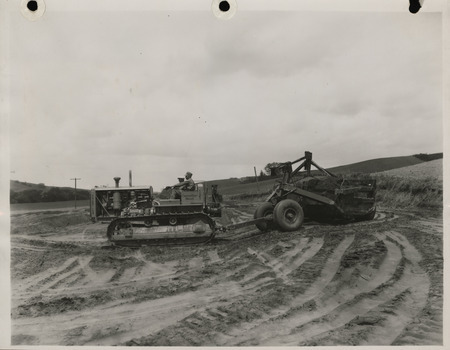 Photograph of a road building machine at the farm-to-market road in Pisgah