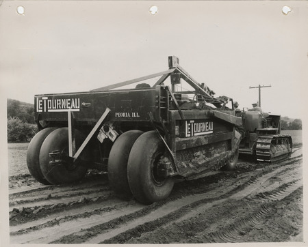 Photograph of a road building machine at the farm-to-market road in Pisgah