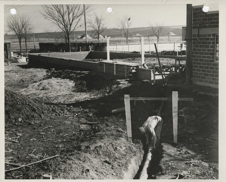 Photograph of the construction of swimming pool bathhouse in the Red Oak City Park