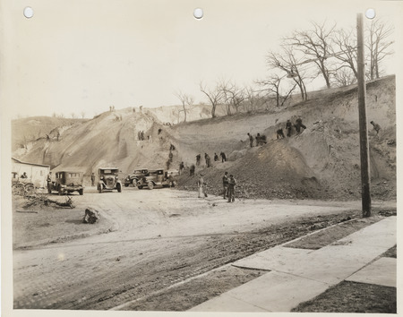 Photograph of people constructing a new entrance to Fairmount Park on 10th Ave. in Council Bluffs