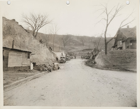 Photograph of people excavating a new entrance to Fairmount Park on 9th Street in Council Bluffs