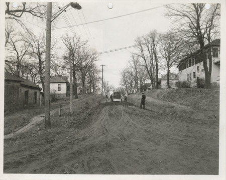 Photograph of people grading and paving Hazel Street in Council Bluffs