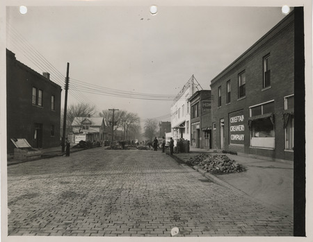 Photograph of people paving Minster Street in Council Bluffs