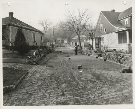 Photograph of people paving West Madison Avenue in Council Bluffs