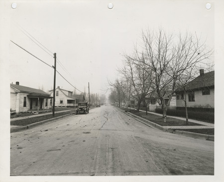 Photograph of raising a street and curb in Council Bluffs